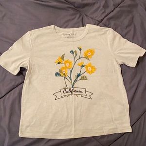 Green T-Shirt with decorative flowers, size medium, never worn!